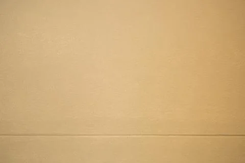 Orange grunge cement wall Stock Photos