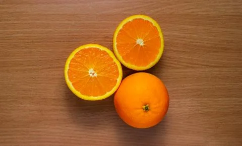 Orange, half of orange Stock Photos