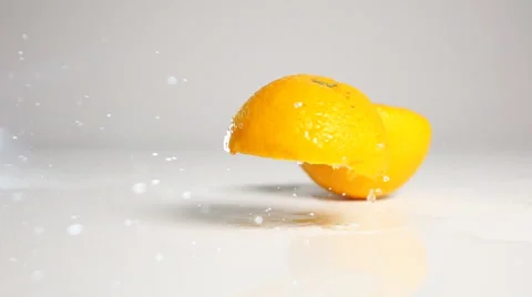 Orange halves drop down Stock Footage 63070246