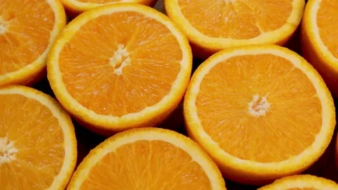 Orange Halves Macro, Rotation, Close-up. Isolated Background of Orange Halves, C Stock Footage 154243449