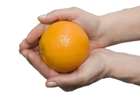 Orange in the hands Foto stock