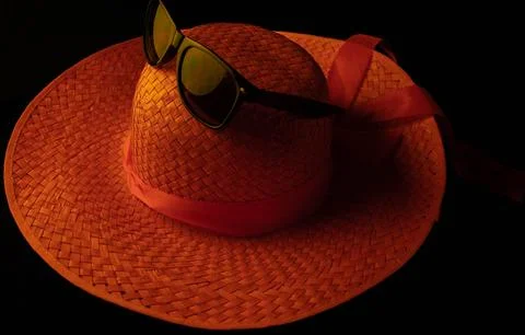 Orange hat in black Stock-Fotos