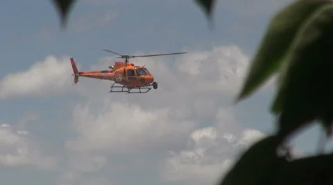 Orange helicopter Stock Footage 49649184