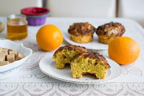 Orange homemade cupcake on the table Stock Photos