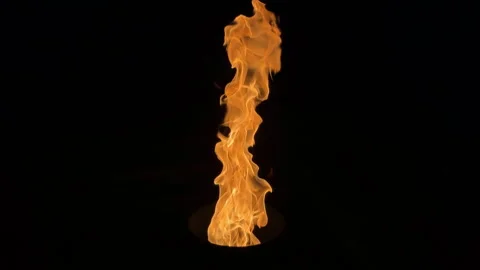 Orange hot fire flames gun isolated on black background. Stock Footage 311570469