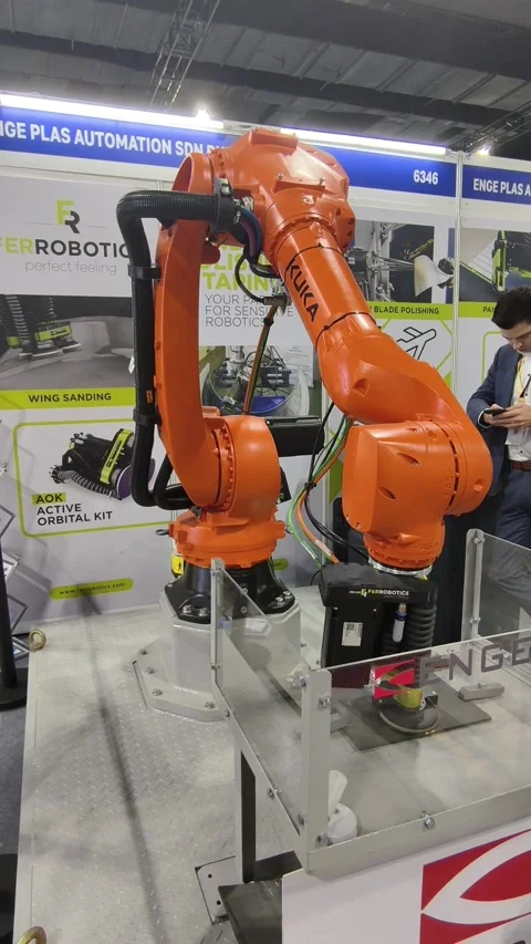 An orange industrial articulating robot arm Stock-Footage 336839063
