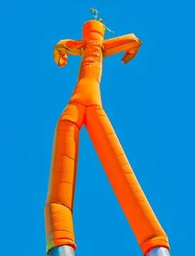 Orange inflatable man Stock Photos