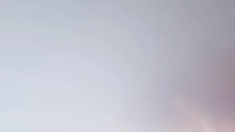 Orange ink diffusing in water Stock-Footage 100023423