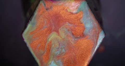 Orange ink splatter color glitter mix hexagon art Stock Footage 339783936