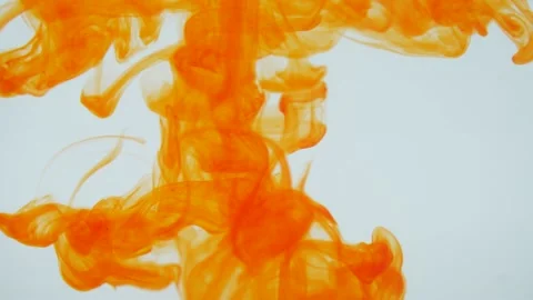 Orange ink in a white water background slow motion Stock Footage 238922706