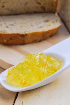 Orange jam and wholegrain bread Stock Photos
