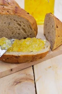 Orange jam and wholegrain bread Stock Photos