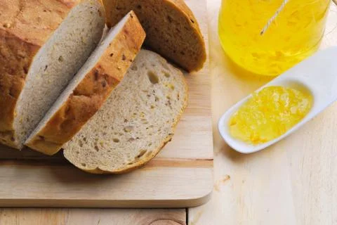 Orange jam and wholegrain bread Stock Photos
