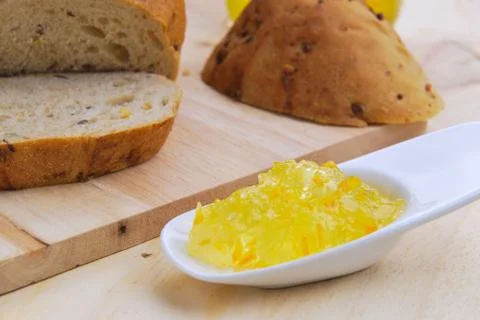 Orange jam and wholegrain bread Stock Photos
