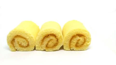 Orange Jam Roll isolated on the white background. Stock Photos