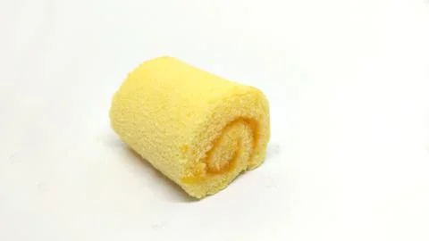 Orange Jam Roll isolated on the white background. Stock Photos