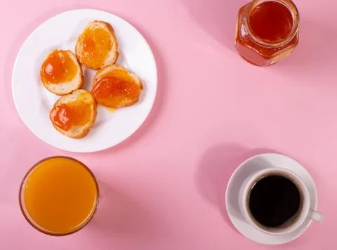 Orange jam toasts Stock Photos