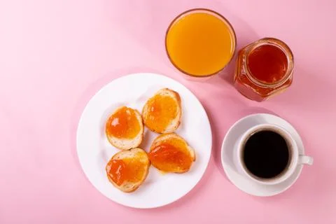 Orange jam toasts Stock Photos