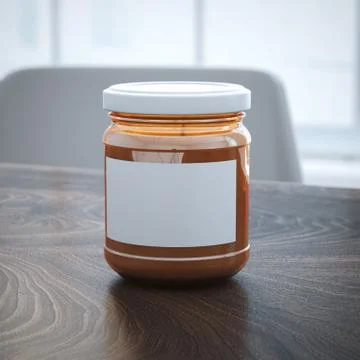Orange jar with blank sticker on the table. 库存插图