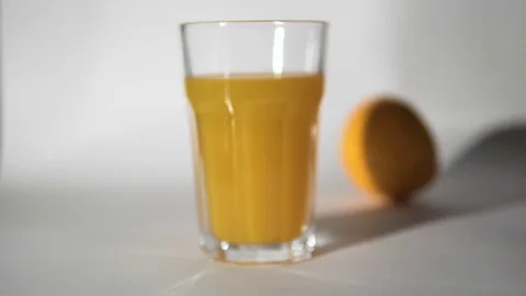 Orange Juice and Rolling Fruit 動画素材 70348352