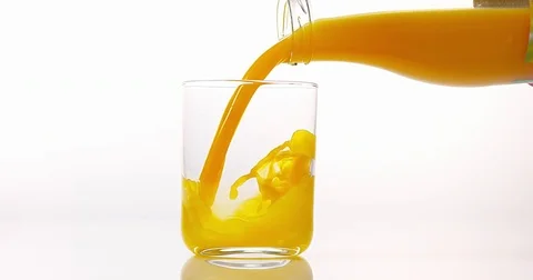 Orange Juice being poured into Glass aga... | Stock Video | Pond5