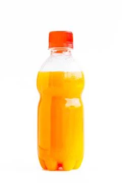 Orange juice in a bottle Photos
