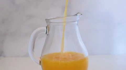 Orange juice in a decanter. Stock Footage 285420215