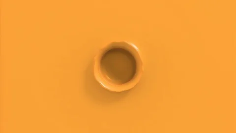Orange juice dropping and splashing forming a beautiful crown splash Stock Footage 85877132