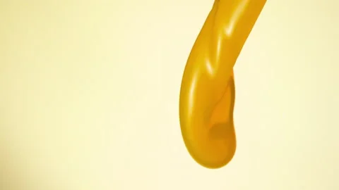 Orange juice falling over flat background Stock Footage 149131966