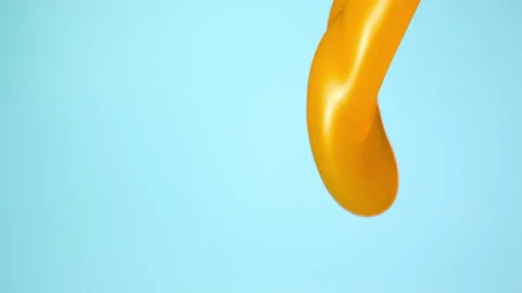 Orange juice falling over flat background Stock Footage 149132270