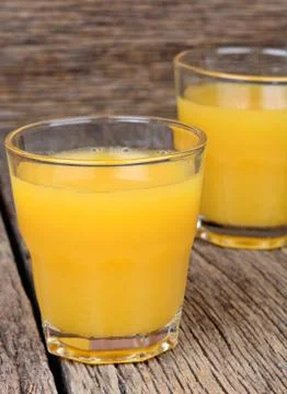 Orange juice in a glasses Stock Photos