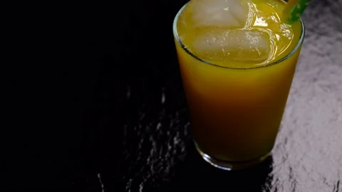 Orange juice with ice Stock Footage 155689089