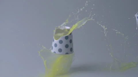 Orange juice in mug smashed on floor, Slow Motion Stock Footage 42058939