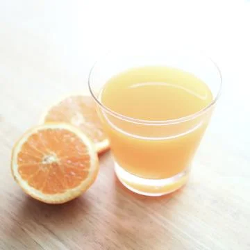 Orange juice Stock Photos