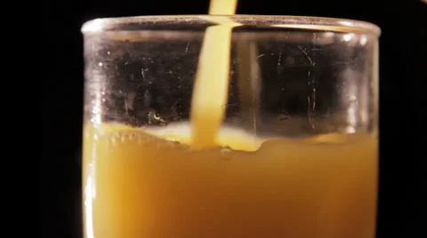 Orange Juice Poured - Close Up Video stock 34206120