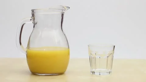 Orange Juice - pouring Stock Footage 8974003