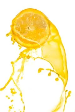 Orange juice splash Stock Photos