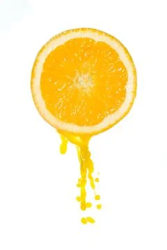 Orange juice splash Stock Photos