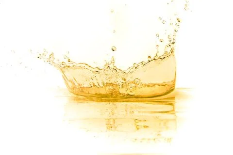 Orange juice splash Stock Photos