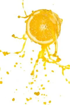 Orange juice splash Stock Photos