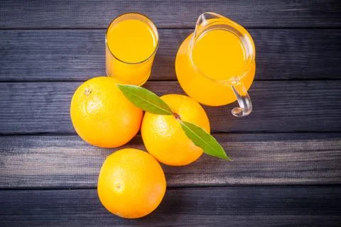 Orange juice on the table. rustic top view still life Stock Photos