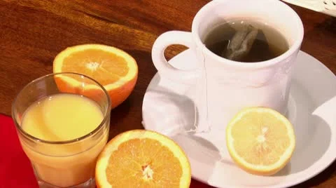 Orange juice, tea Stock Footage 10767090