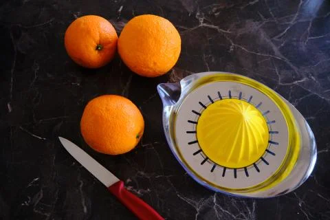 Orange Juice, Vitamin C Boost, Freshly hand juiced fruit juice. Half cut oran Stock Photos