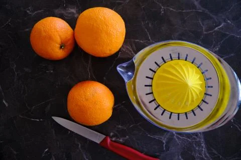 Orange Juice, Vitamin C Boost, Freshly hand juiced fruit juice. Half cut oran Stock Photos