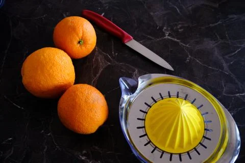 Orange Juice, Vitamin C Boost, Freshly hand juiced fruit juice. Half cut oran Stock Photos