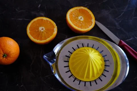 Orange Juice, Vitamin C Boost, Freshly hand juiced fruit juice. Half cut oran Stock Photos