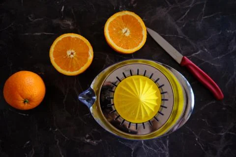 Orange Juice, Vitamin C Boost, Freshly hand juiced fruit juice. Half cut oran Stock Photos