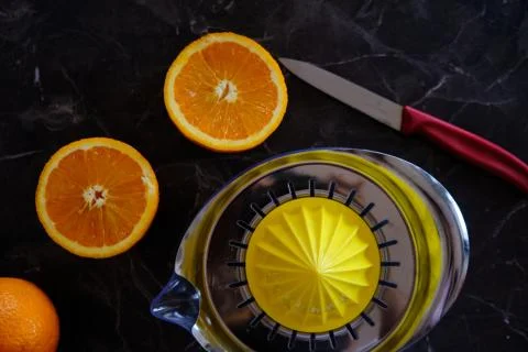 Orange Juice, Vitamin C Boost, Freshly hand juiced fruit juice. Half cut oran Stock Photos