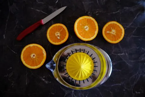 Orange Juice, Vitamin C Boost, Freshly hand juiced fruit juice. Half cut oran Stock Photos