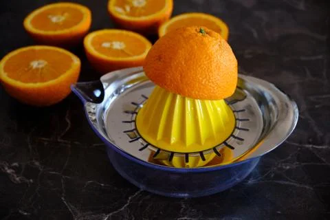 Orange Juice, Vitamin C Boost, Freshly hand juiced fruit juice. Half cut oran Stock Photos